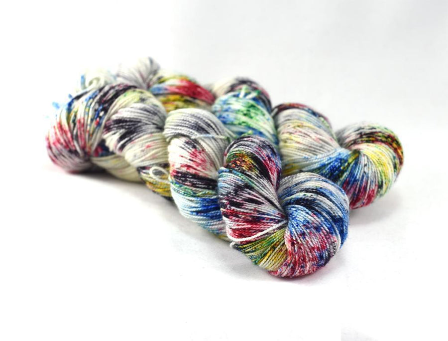 Destination Yarn fingering weight yarn Five Rings Speckled