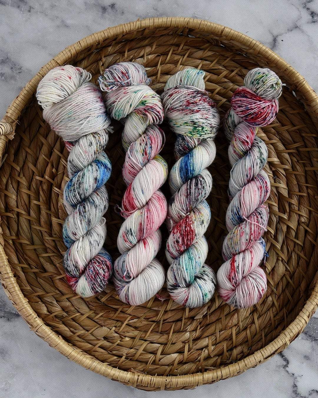 Destination Yarn fingering weight yarn Five Rings Speckled