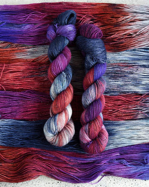Destination Yarn fingering weight yarn Vermilion Summer